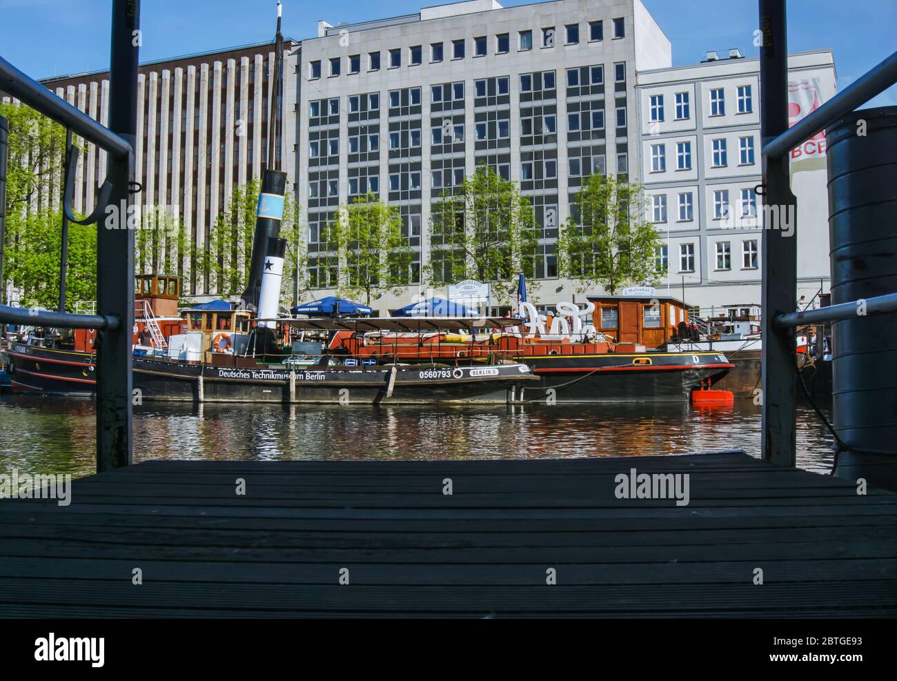 View from the opposite jetty to the historic harbor on the Spree in Berlin-Mitte. Stock Photo