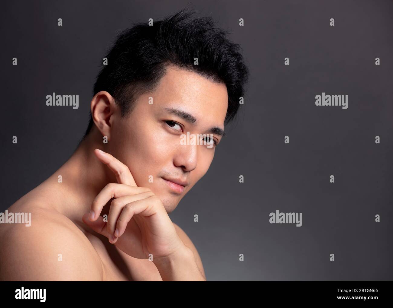 Closeup  of attractive young asian man face Stock Photo