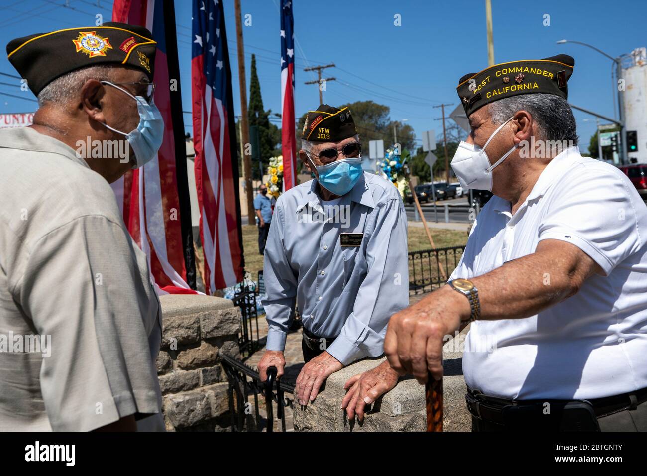Veterans wearing face masks as a preventive measure against the spread of COVID 19 pandemic attend a Memorial Day Ceremony in Los Angeles.The event took place at the Los Cinco Puntos/Five Points Memorial that honours Mexican American soldiers who died in the World War II, the Korean War, and the Vietnam War. Stock Photo