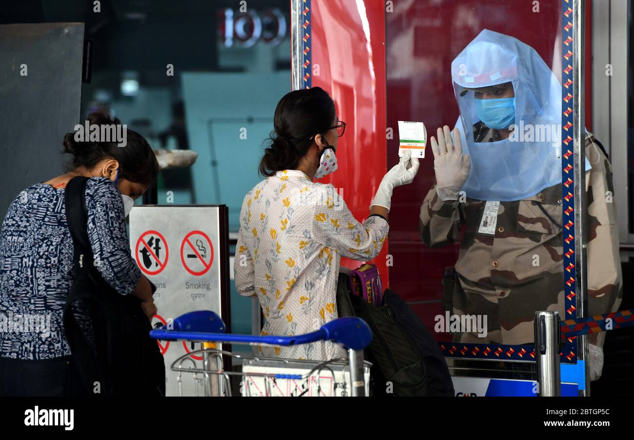 Beijing, India. 25th May, 2020. A security guard (R) is on duty at the Indira Gandhi International Airport in New Delhi, India, May 25, 2020. India's federal government has allowed domestic flights to resume from Monday. Credit: Partha Sarkar/Xinhua/Alamy Live News Stock Photo