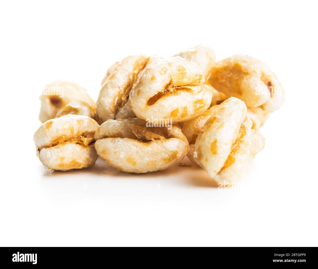 Puffed wheat covered with honey isolated on white background. Stock Photo