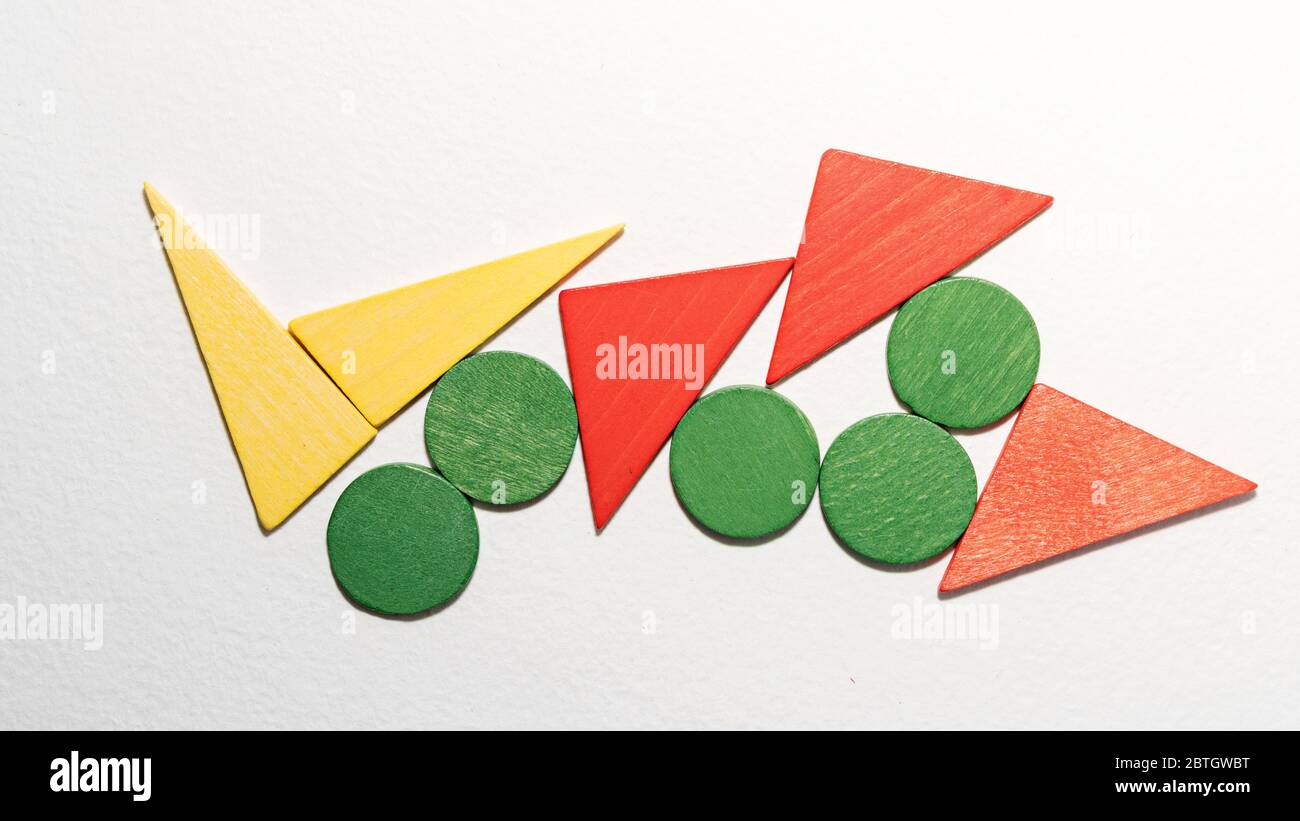 Different colorful shapes wooden on white background. Geometric shapes ...