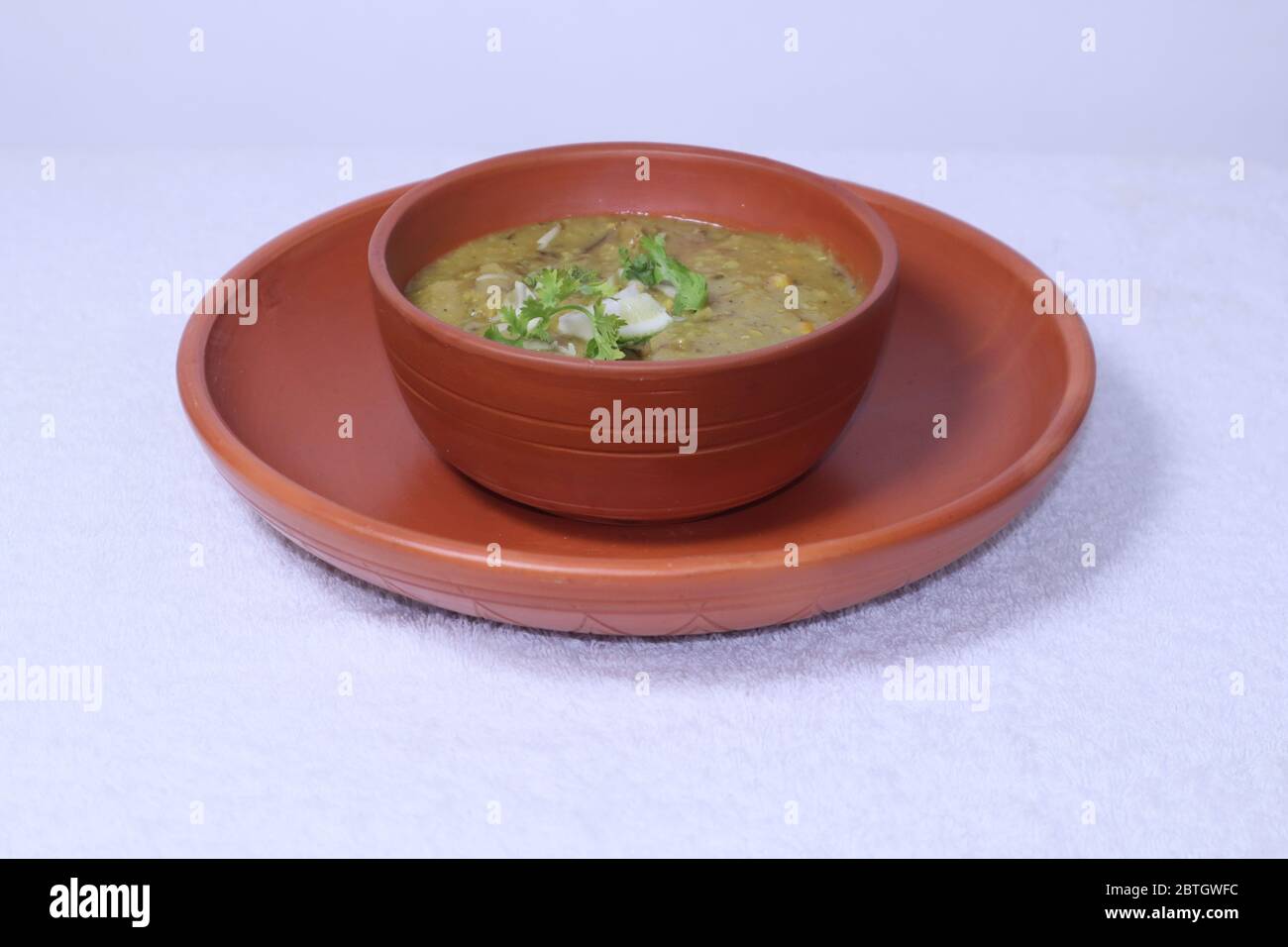 Halim food in an earthenware pot Stock Photo