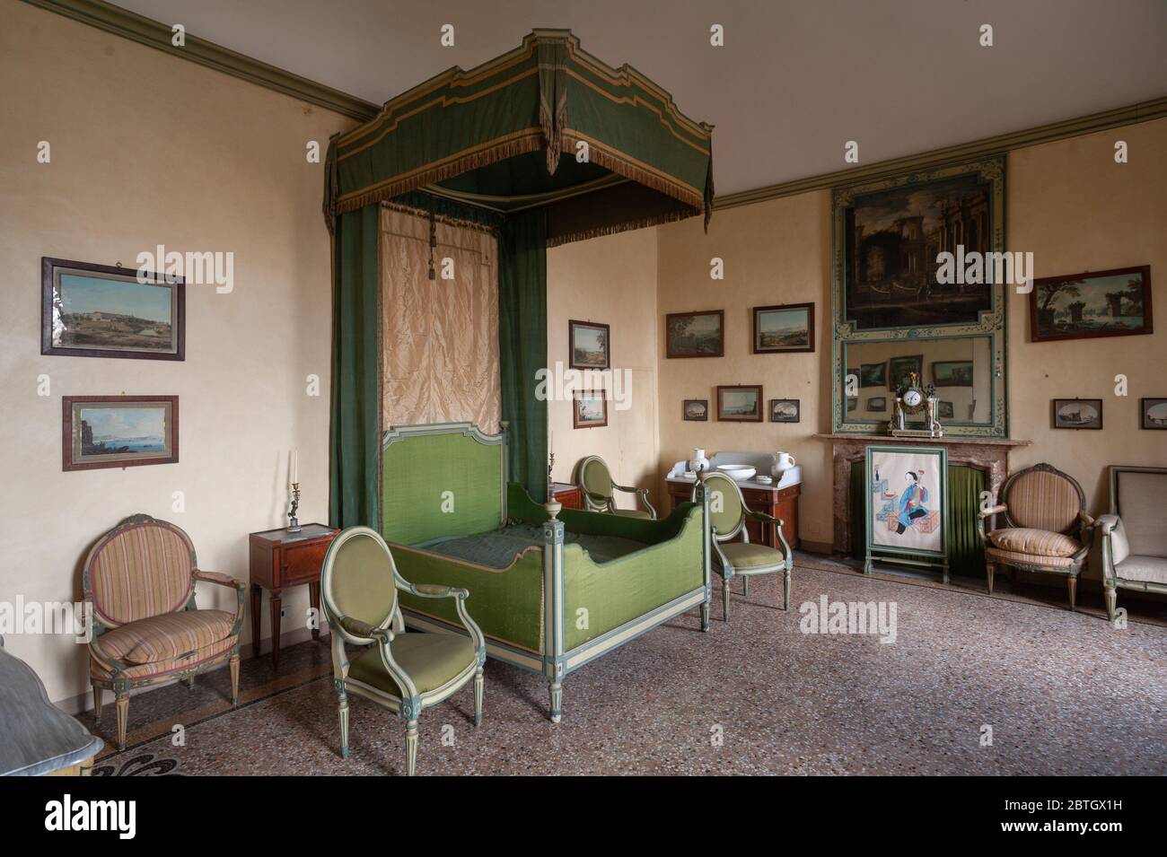 Santena, Italy - December 2010: The bedroom of the country residence of Camillo Benso, Count of Cavour, next to Turin. Stock Photo