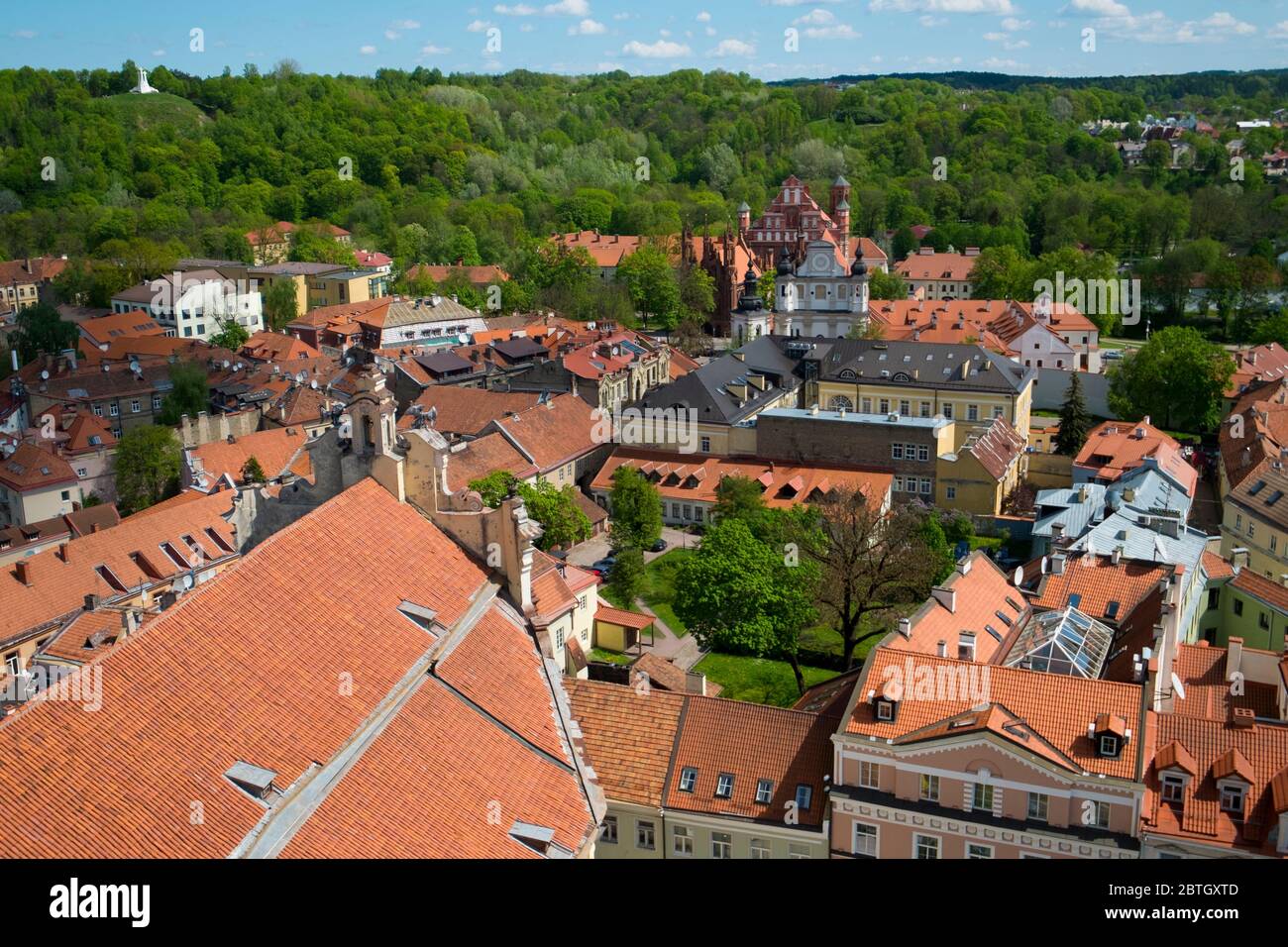 One of the city views from the bell tower at Vilnius University. Looking toward St Anne church. In the historic Old Town section of Vilnius, Lithuania Stock Photo