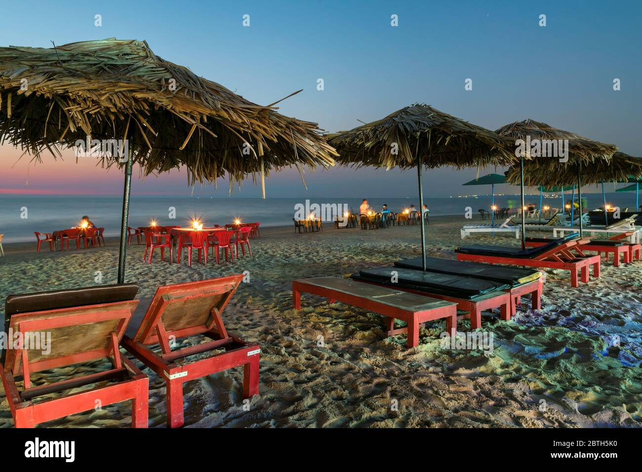 Night beach chairs and cafe party in GOA, India Stock Photo