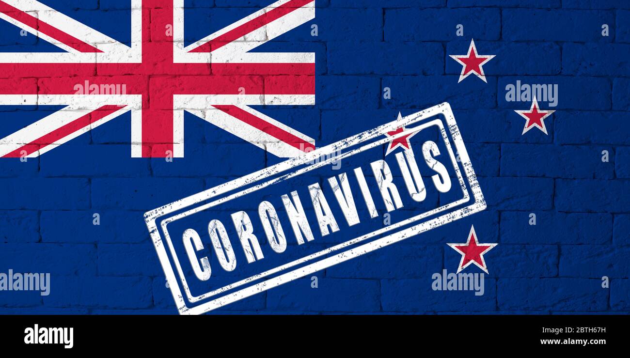 Flag of the New-Zeland with original proportions. stamped of Coronavirus. brick wall texture. Corona virus concept. On the verge of a COVID-19 or 2019 Stock Photo