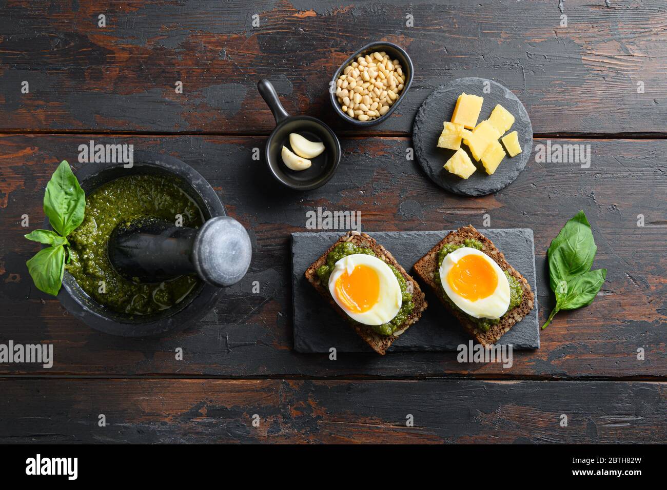 Fresh Green basil pesto eggs panini bread with pesto and hot sriracha