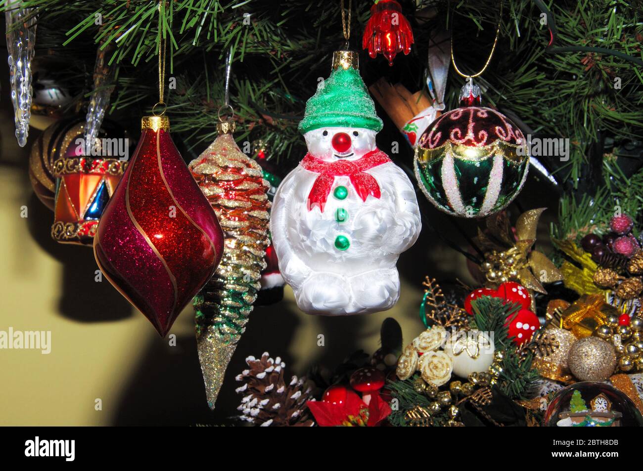 Glass Christmas Tree Decorations hanging in an ornamental Christmas