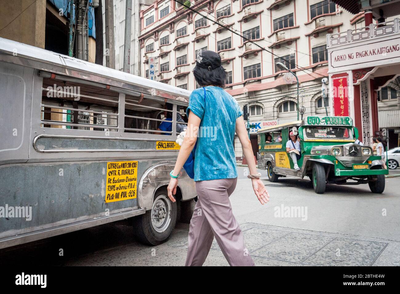 Shots of the traffic at the busy junction at the Filipino Chinese Friendship Arch in the Binondo Chinatown district of Manila Philippines. Stock Photo