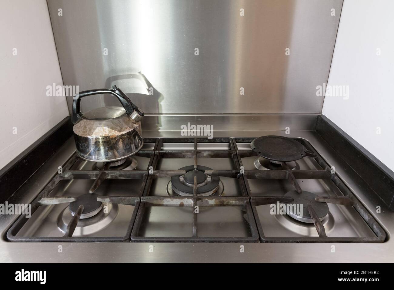 Teapot on gas stove hires stock photography and images Alamy