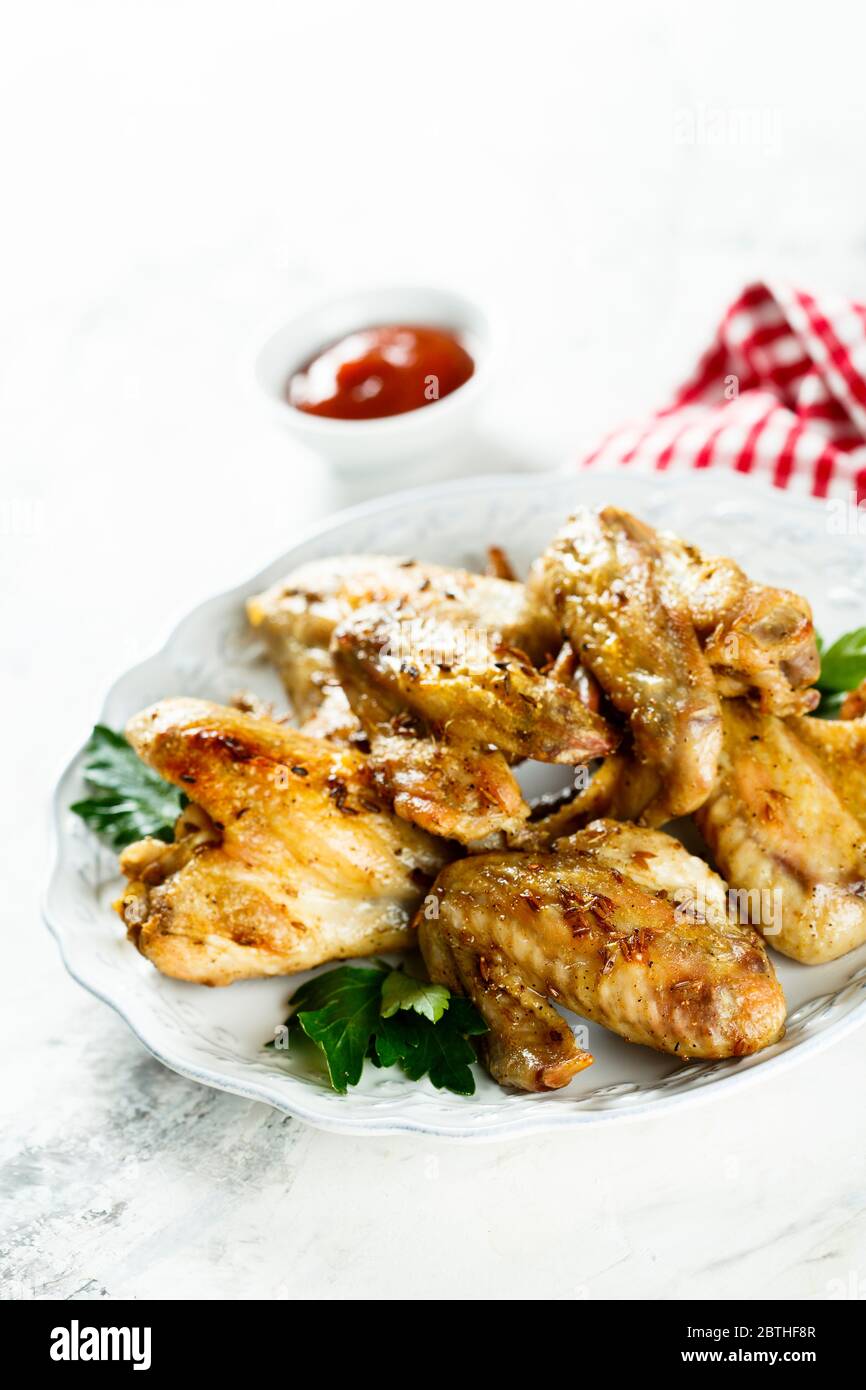 Roasted chicken wings with spices Stock Photo Alamy