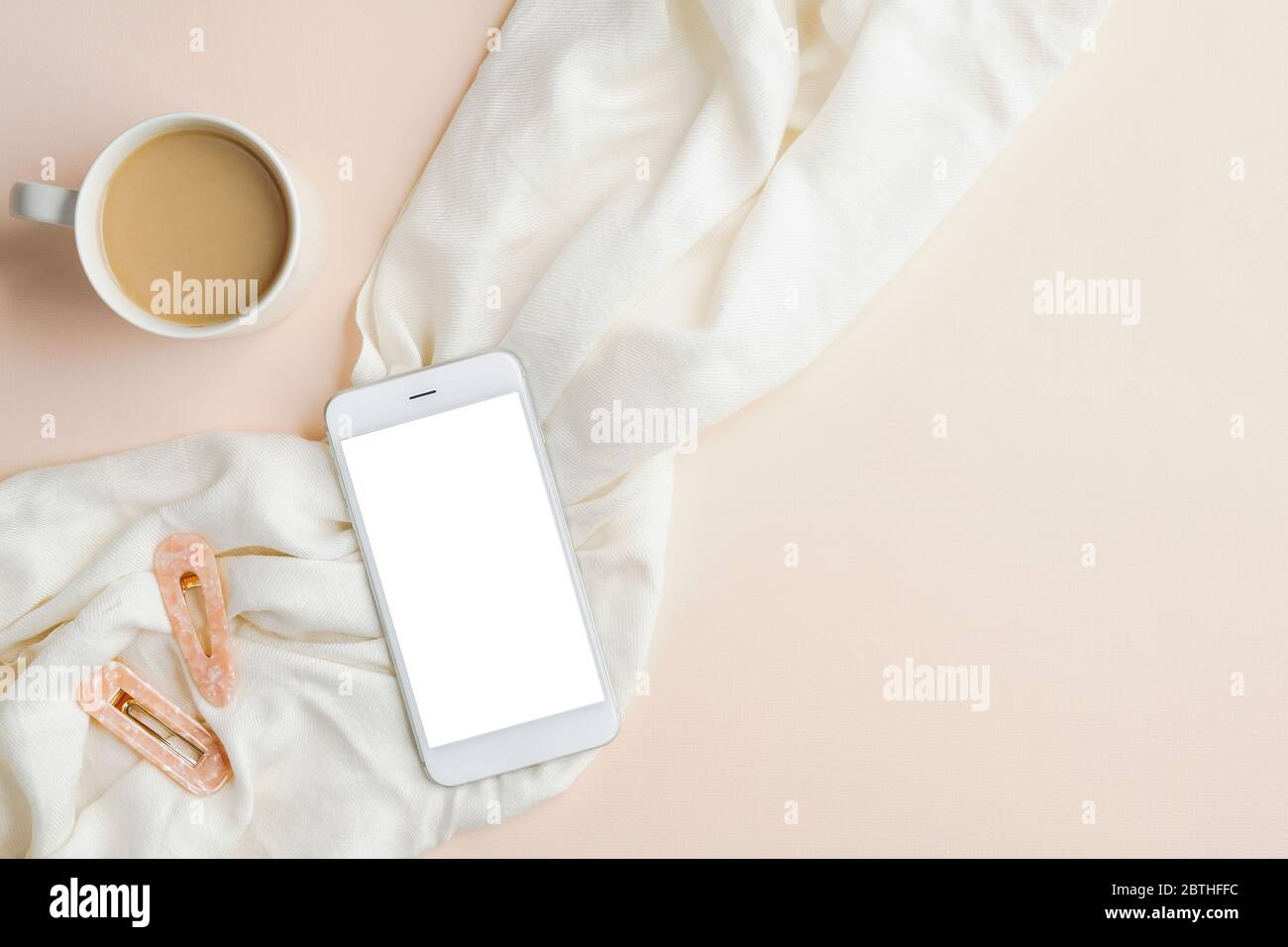 Flat Lay Cup Of Coffee Smartphone With Blank Screen Mockup White Blanket And Female Accessories On Beige Table Top View Feminine Workspace Home Of Stock Photo Alamy