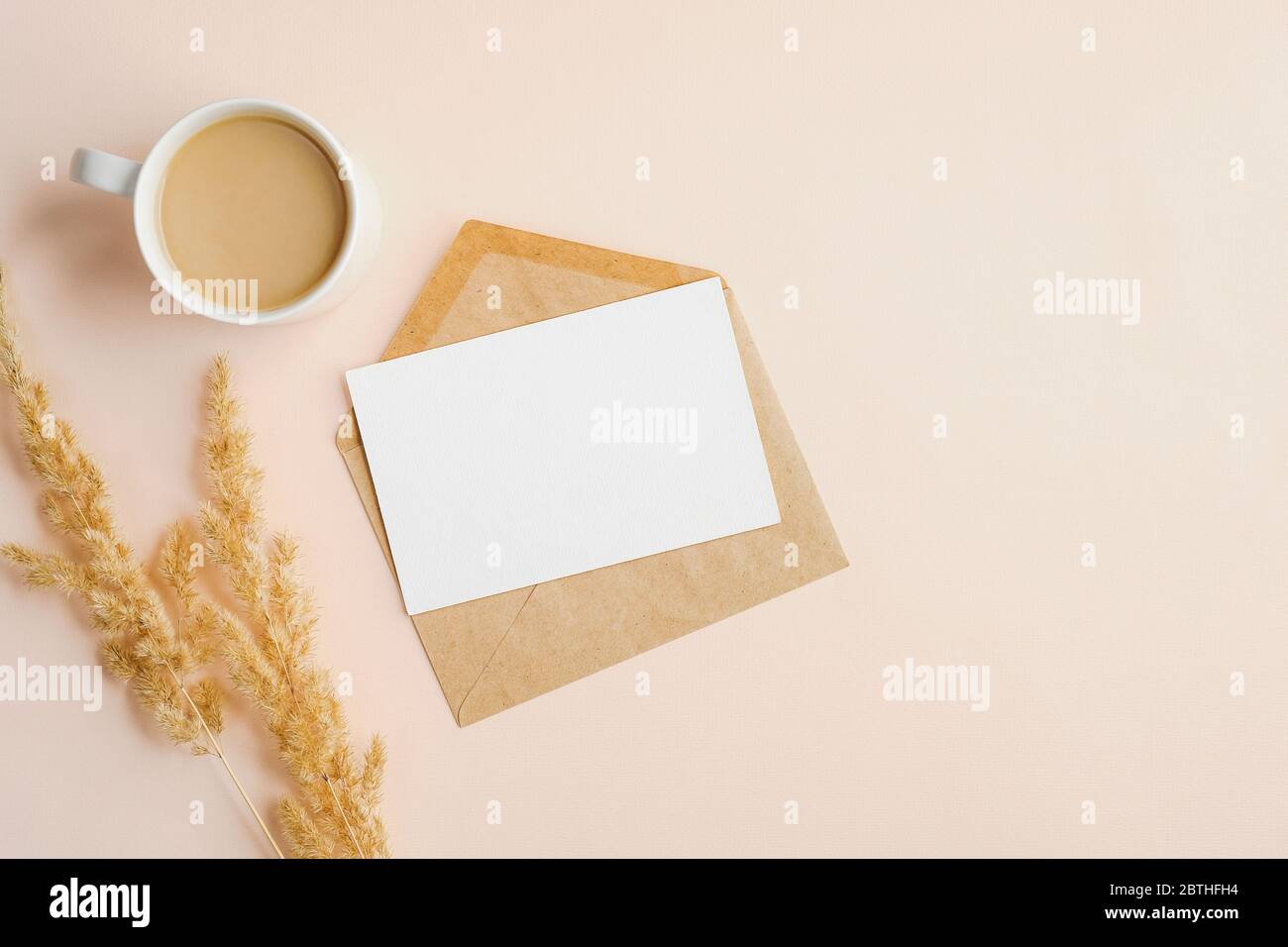 Kraft Paper Envelope With Blank Wedding Invitation Card Mockup Cup Of Coffee And Dry Flowers On Beige Background Flat Lay Top View Stock Photo Alamy