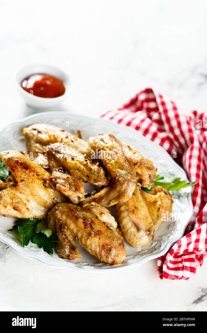 Roasted chicken wings with spices Stock Photo Alamy