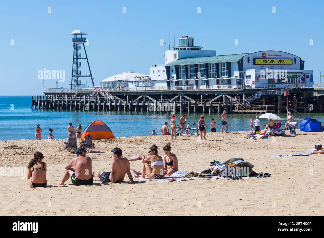 Bournemouth, Dorset UK. 26th May 2020. UK weather: another hot sunny day at Bournemouth beaches with clear blue skies and unbroken sunshine, as the glorious weather continues and temperatures rise. Sunseekers head to the seaside to enjoy the sunshine. Credit: Carolyn Jenkins/Alamy Live News Stock Photo