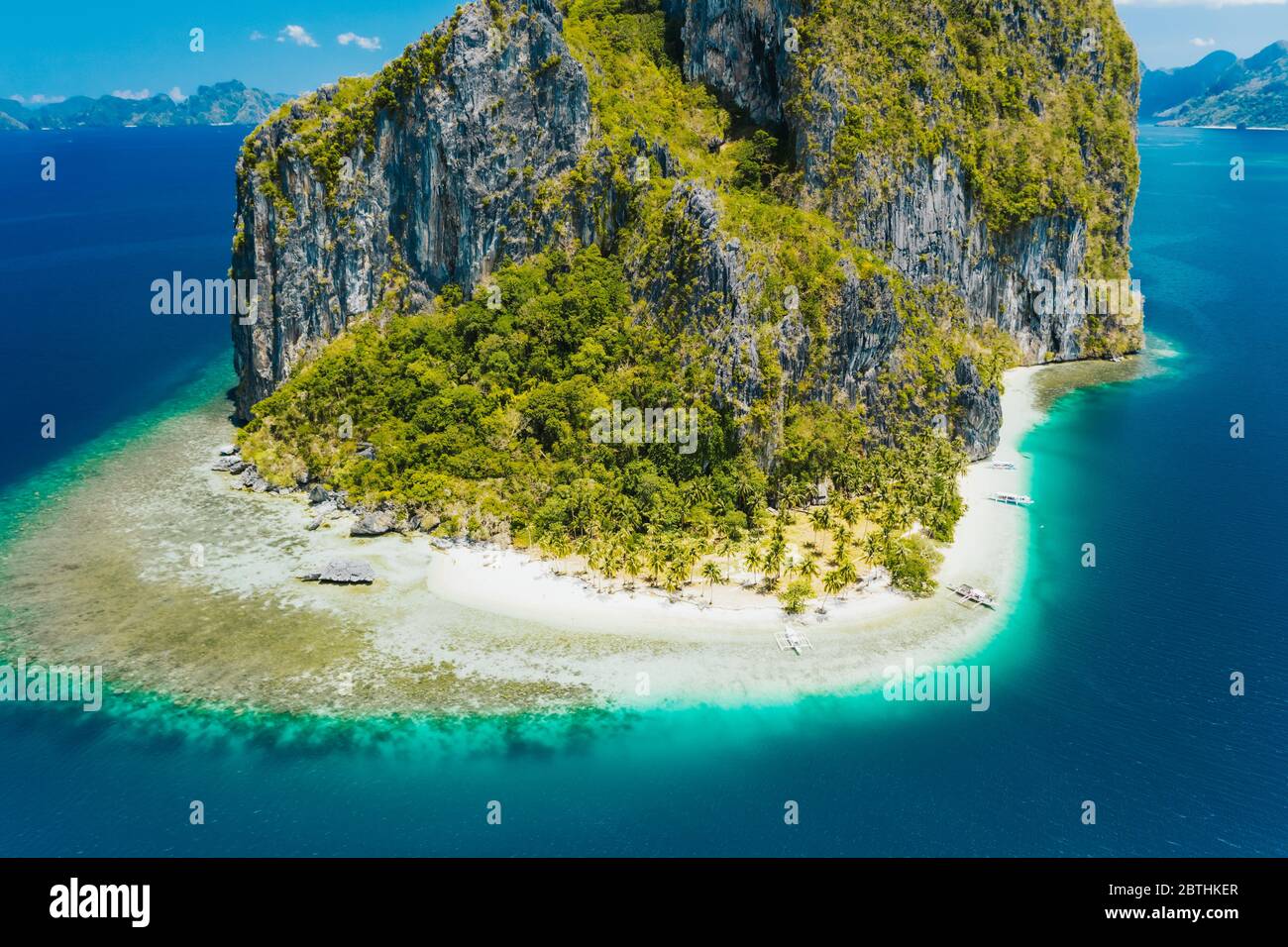 El Nido, Palawan, Philippines. Aerial drone view of impressive Pinagbuyutan Island. Amazing white sand Ipil beach with turquoise blue ocean and coral Stock Photo