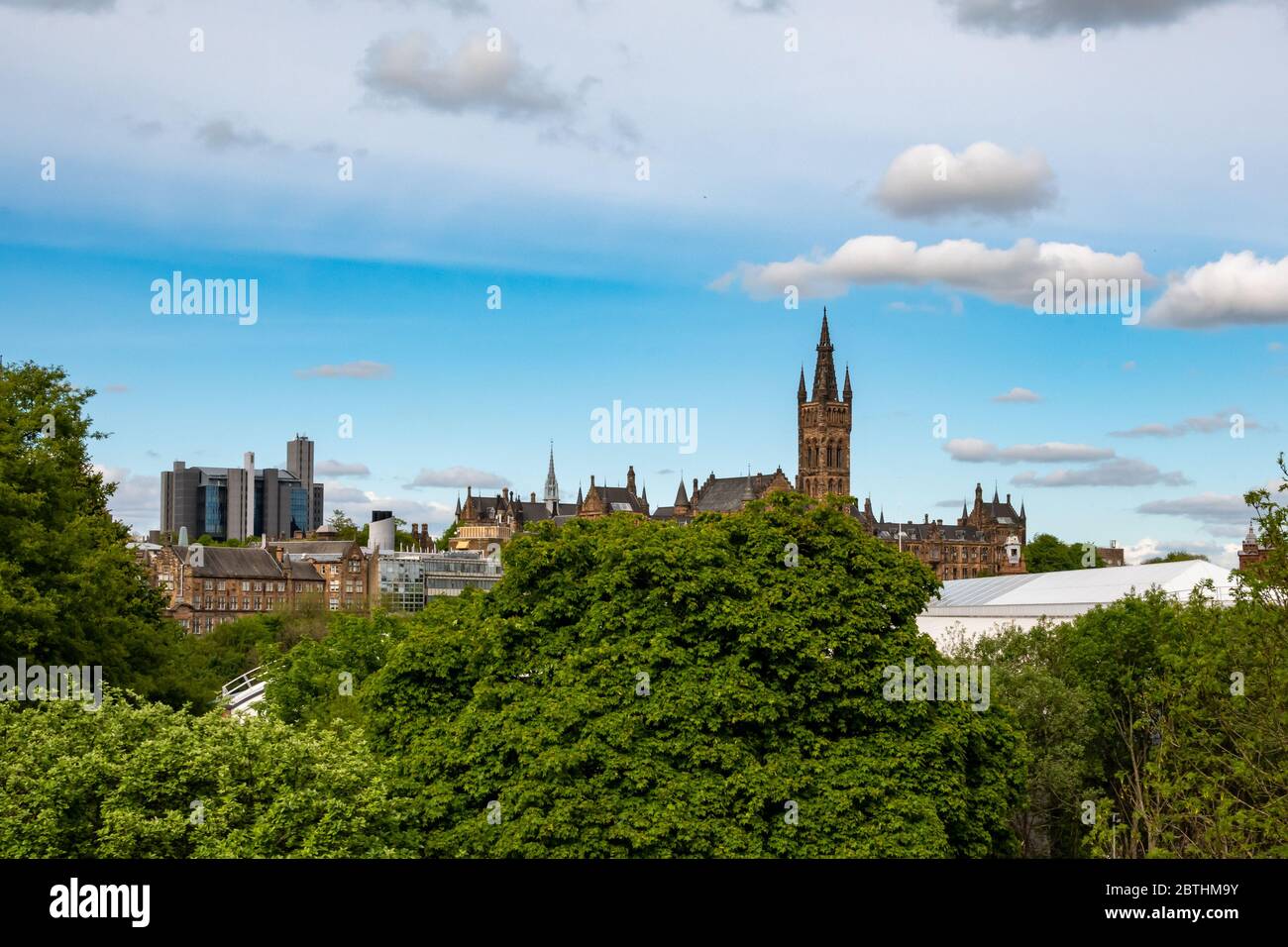 The West End of Glasgow with Glasgow University's The Gilbert Scott Building and the Library dominating the skyline Stock Photo