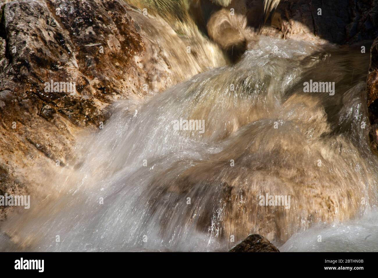 Watercourse in the dolomites Stock Photo