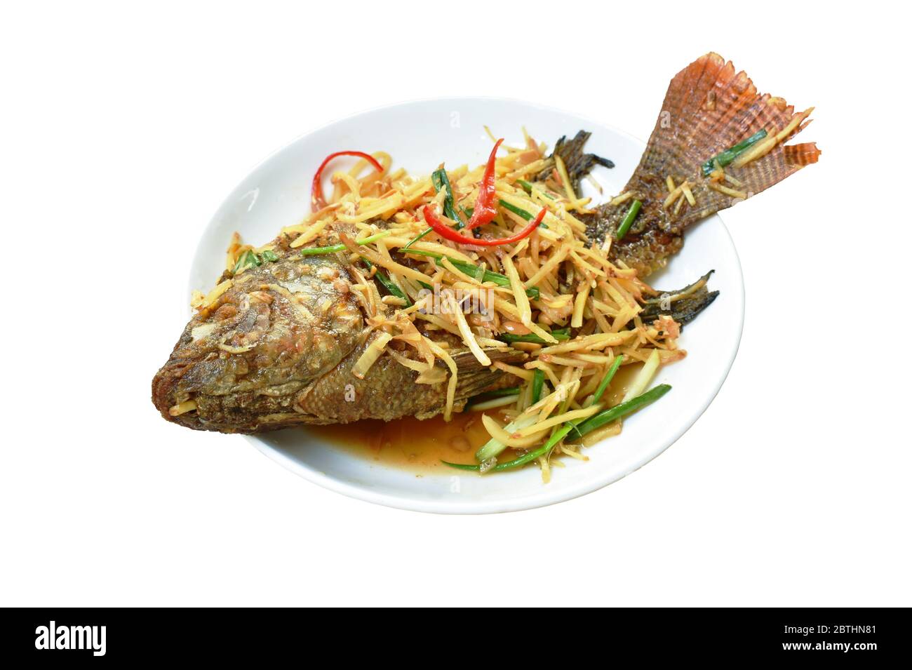 deep fried Nile Tilapia or mango fish slice dressing soy sauce and