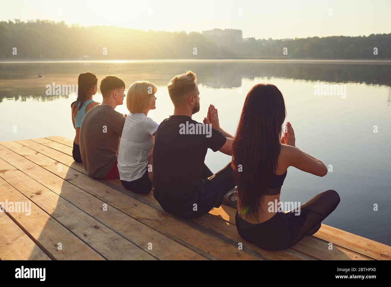 Group of people resting relax in the park by the lake Stock Photo