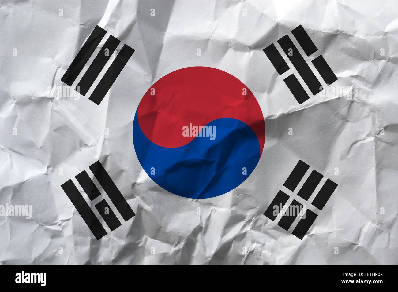 Korea national flag on crumpled paper. Stock Photo