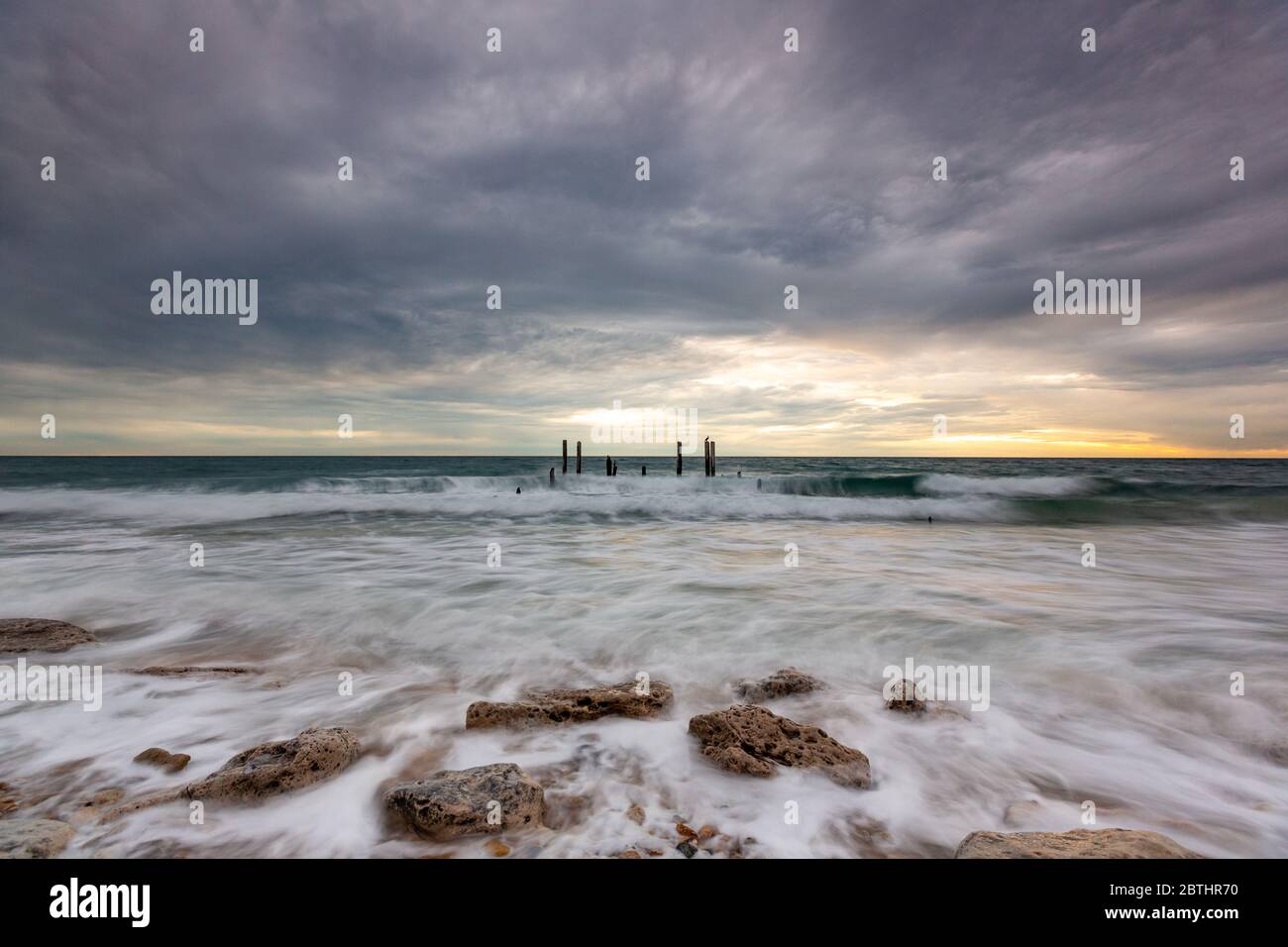 The iconic port willunga jetty ruins at high tide and long exposures located on the Fleurieu Peninsula South Australia on the 26th May 2020 Stock Photo
