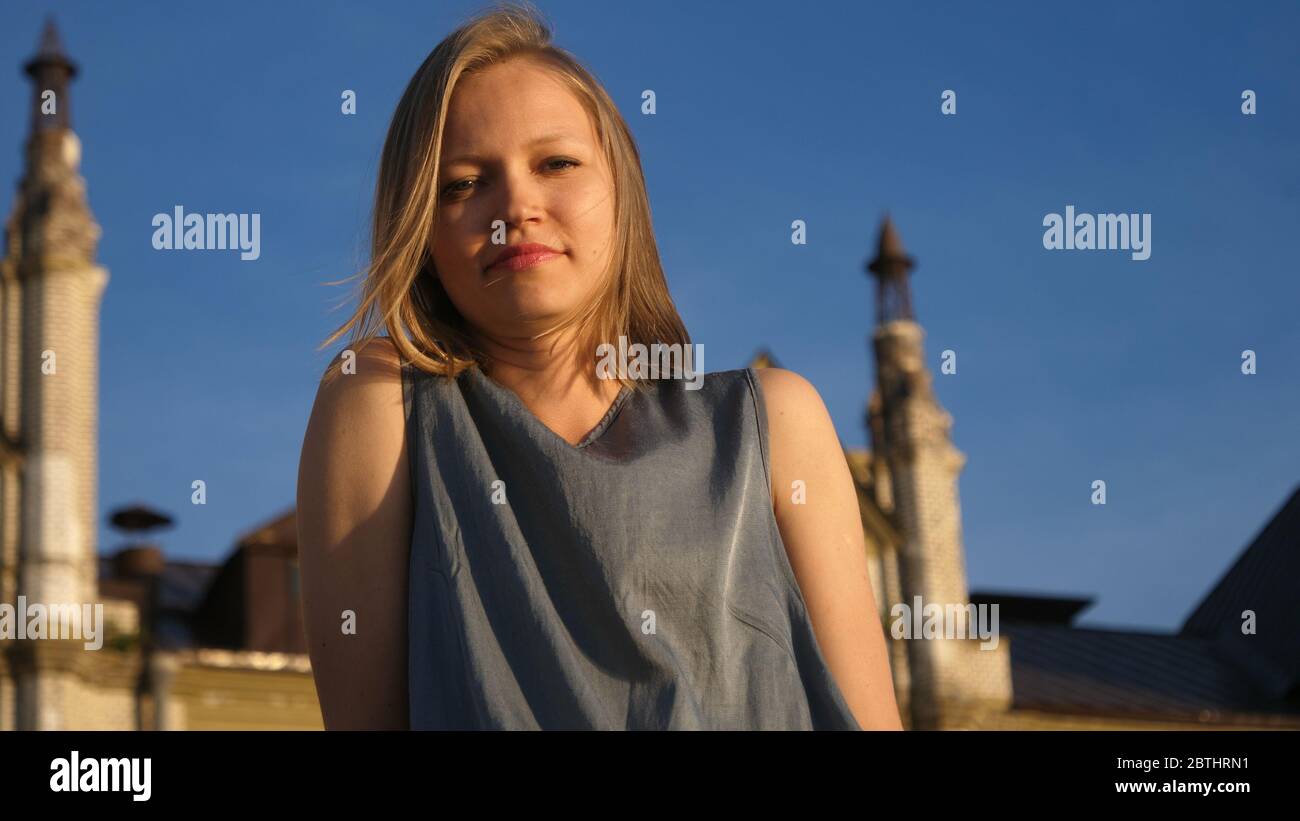 Independent attractive blonde friendly looking at camera. Stock Photo