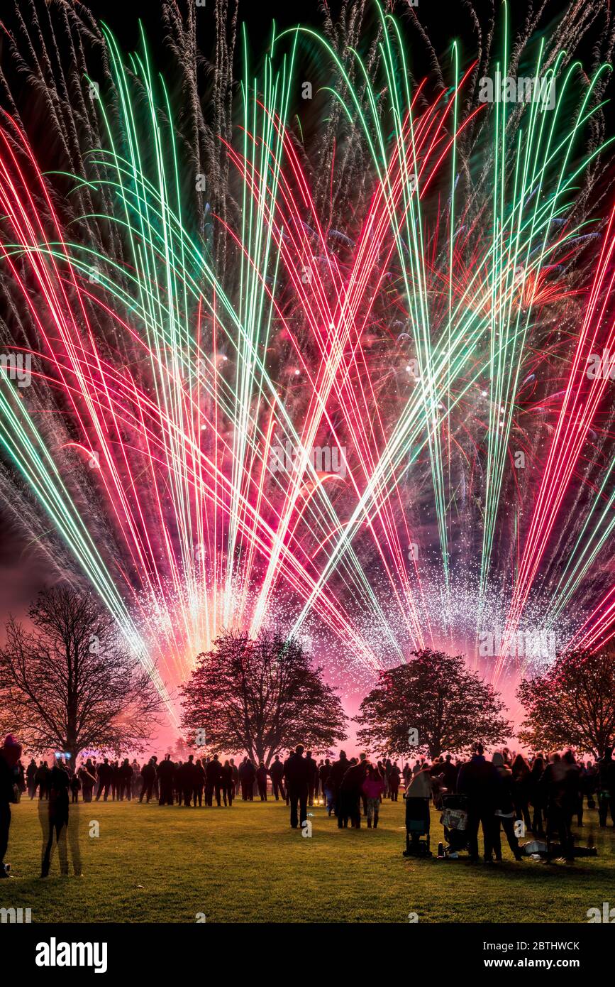 The annual firework display at Ashton Keynes saw a large crowd enjoy an impressive display on the school playing field in the picturesque North Wiltsh Stock Photo