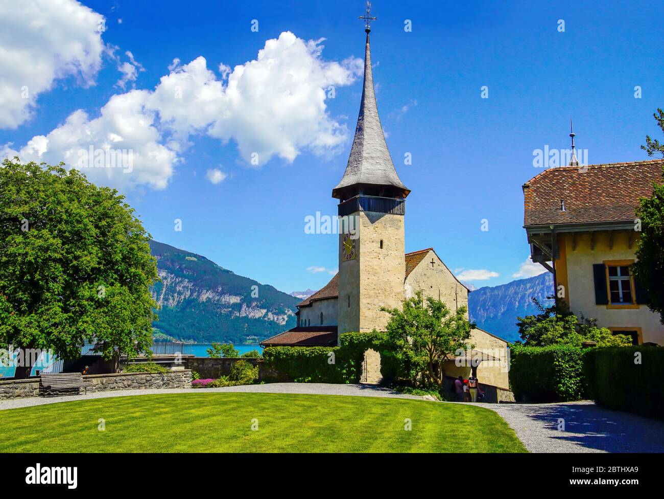 Church by Spiez Castle is the 1000-year old in early Romanesque style, Lake Thun, Bernese Oberland, Bern canton, Switzerland. Stock Photo