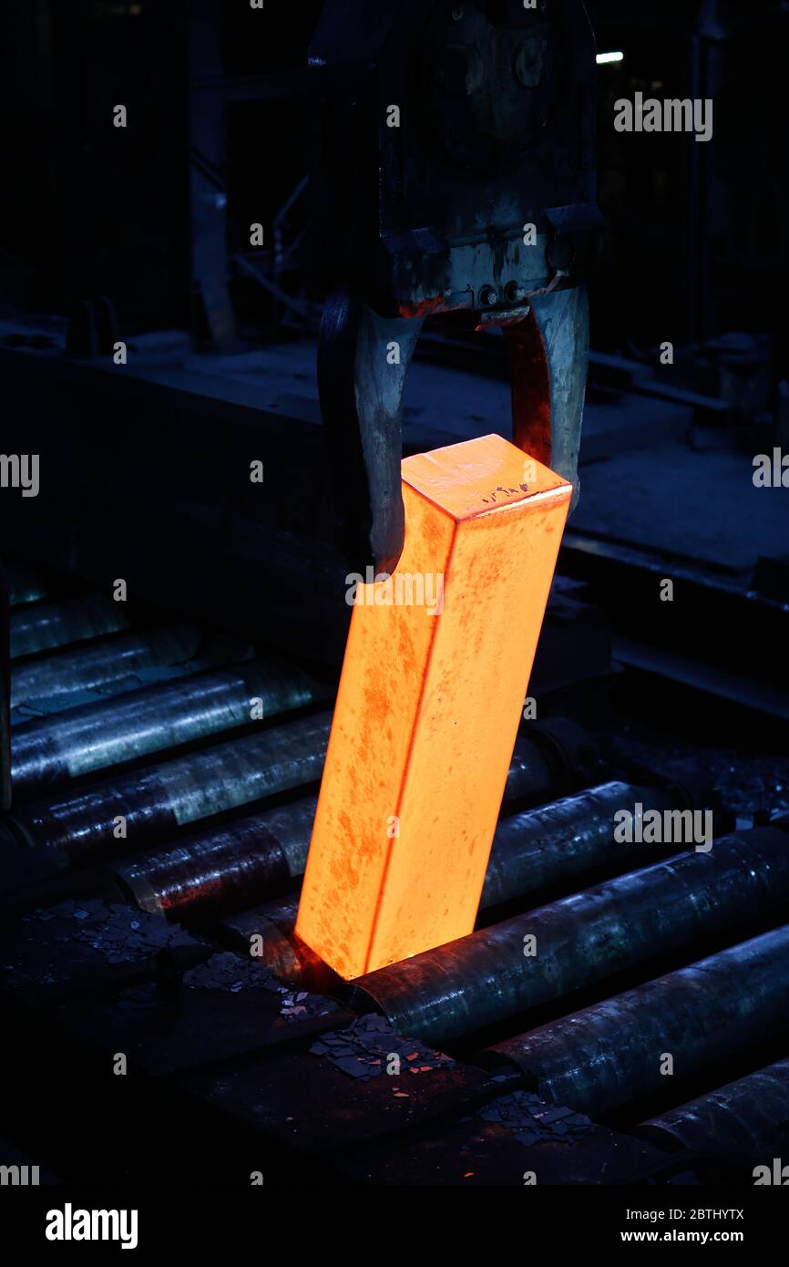 Hot steel bar in production Stock Photo