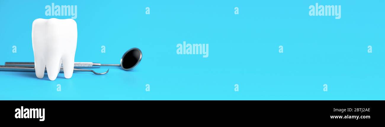 Dental model and dental equipment on blue background, concept image of