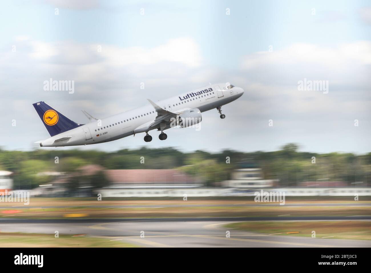 Berlin, Germany. 26th May, 2020. A plane of Lufthansa takes off at the Berlin Tegel Airport in Berlin, capital of Germany, May 26, 2020. German flag carrier Deutsche Lufthansa AG said on Monday that the federal government's Economic Stabilization Fund (WSF) has approved a nine-billion-euro rescue package (9.8 billion U.S. dollars) for the company. Credit: Shan Yuqi/Xinhua/Alamy Live News Stock Photo