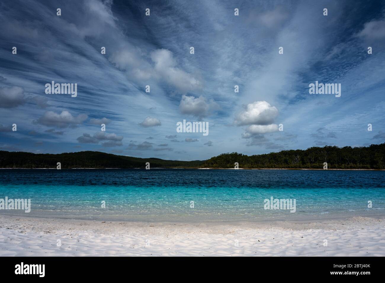 Crystal clear blue water of Lake McKenzie. Stock Photo