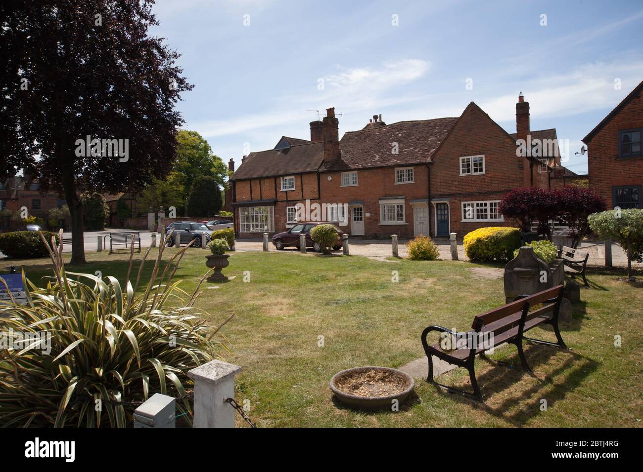 A communal garden with houses in the old town in Beaconsfield in