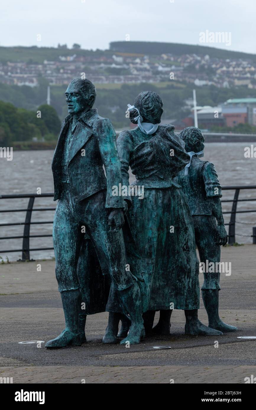 Emigrating family sculpture Stock Photo