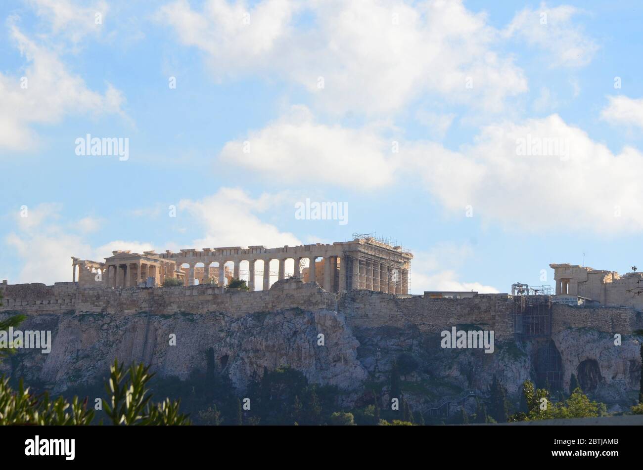 The Parthenon is a former temple on the Athenian Acropolis, Greece, dedicated to the goddess Athena, whom the people of Athens considered their patron Stock Photo