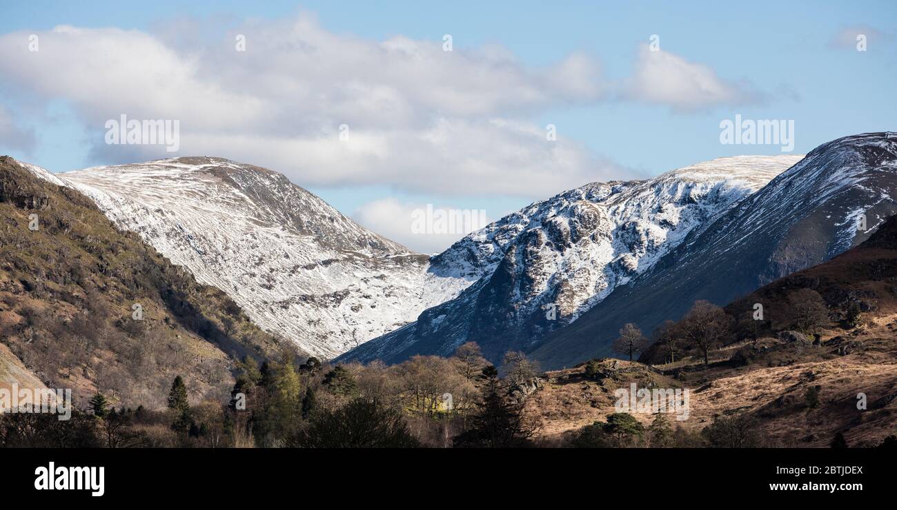Snow covered mountains on a spring day in the Lake District, England Stock Photo