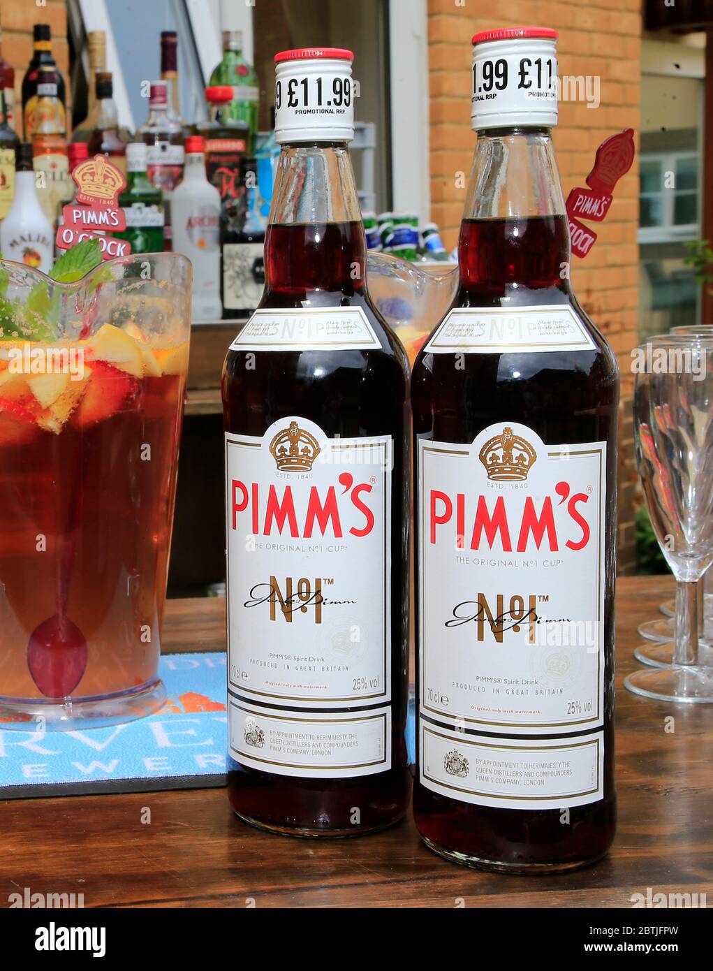 Bottles of Pimms on a bar. Stock Photo