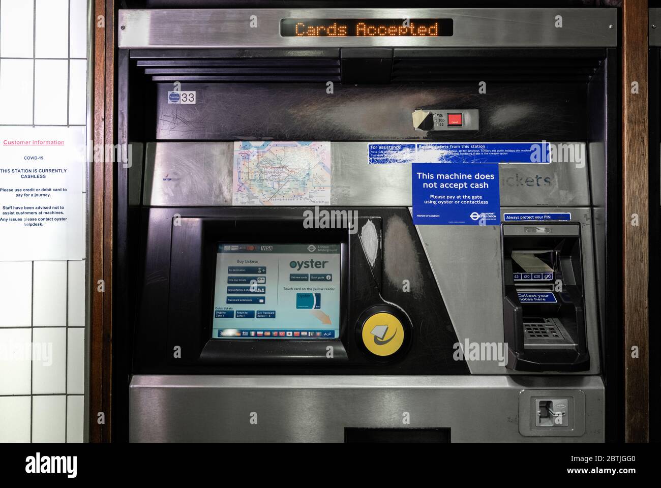 Ticket machines on the London Underground stop taking cash during the  COVID-19 pandemic. Oxford Circus, London UK. May 2020 Stock Photo - Alamy