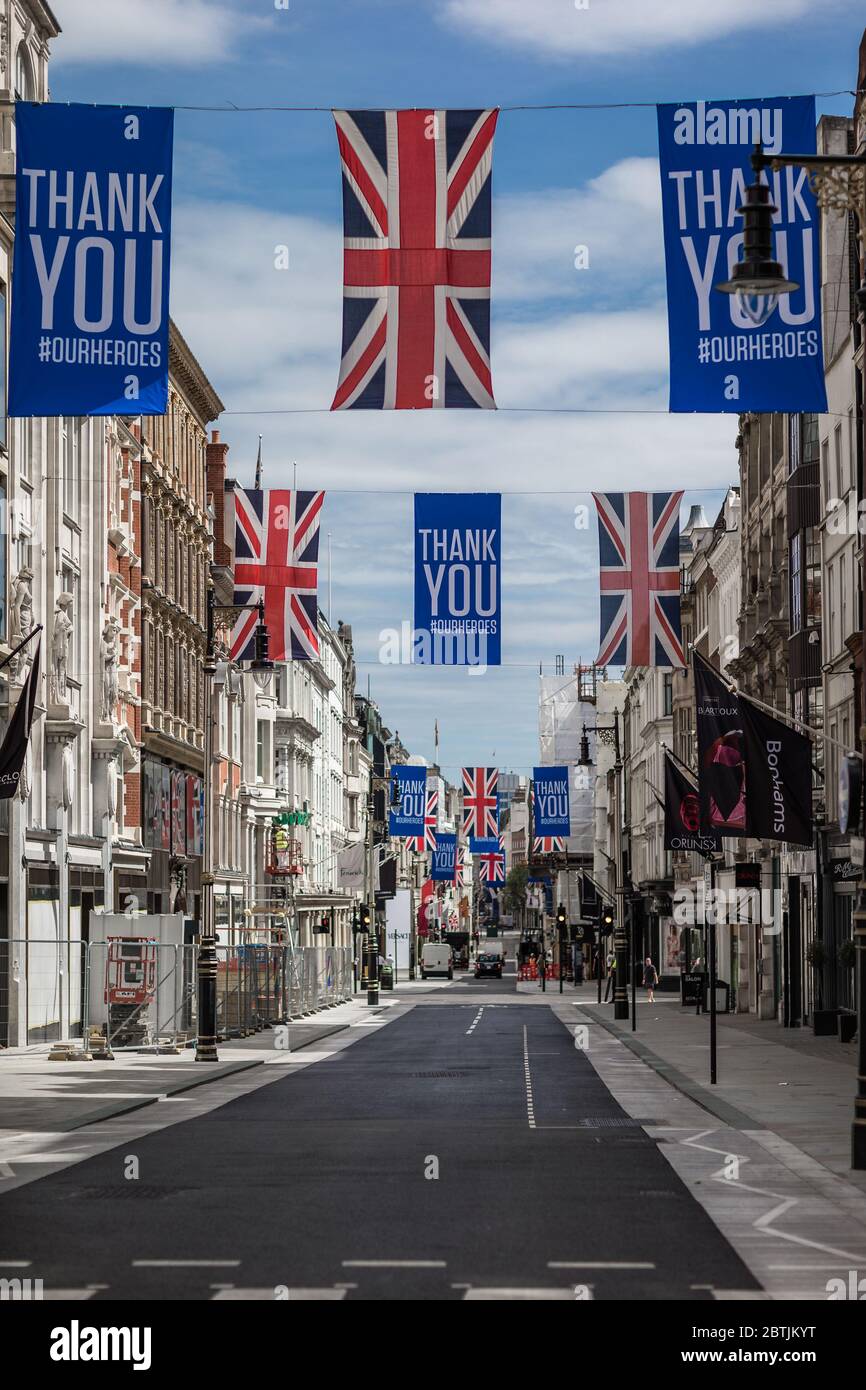 Populated with Thank You #OURHEROES banners on a famous street in London during the coronavirus pandemic health crisis in UK. Stock Photo