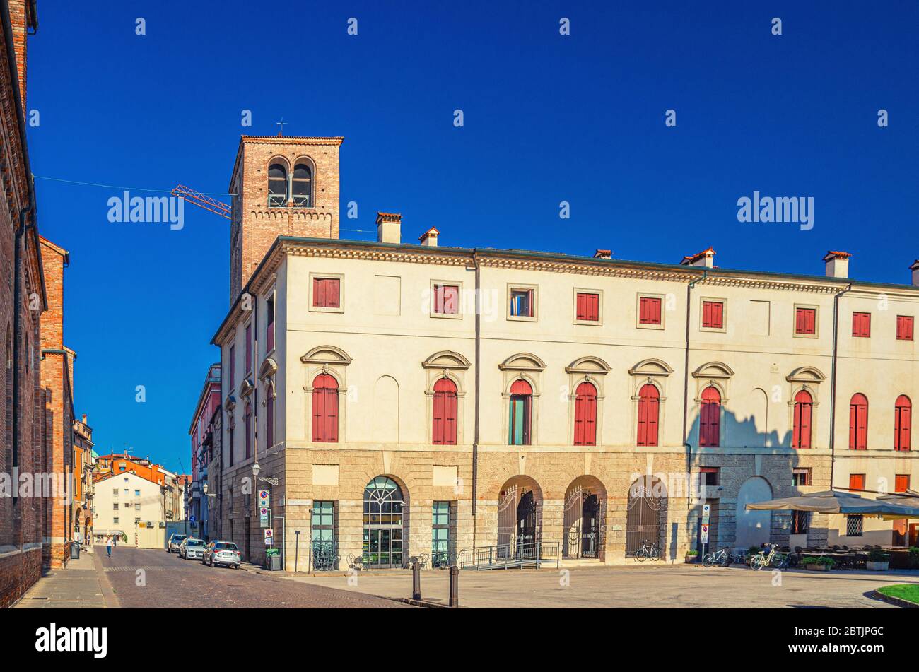 Palazzo delle Opere Sociali palace building with brick tower in Piazza del Duomo square in old historical city centre of Vicenza city, blue sky background, Veneto region, Italy Stock Photo