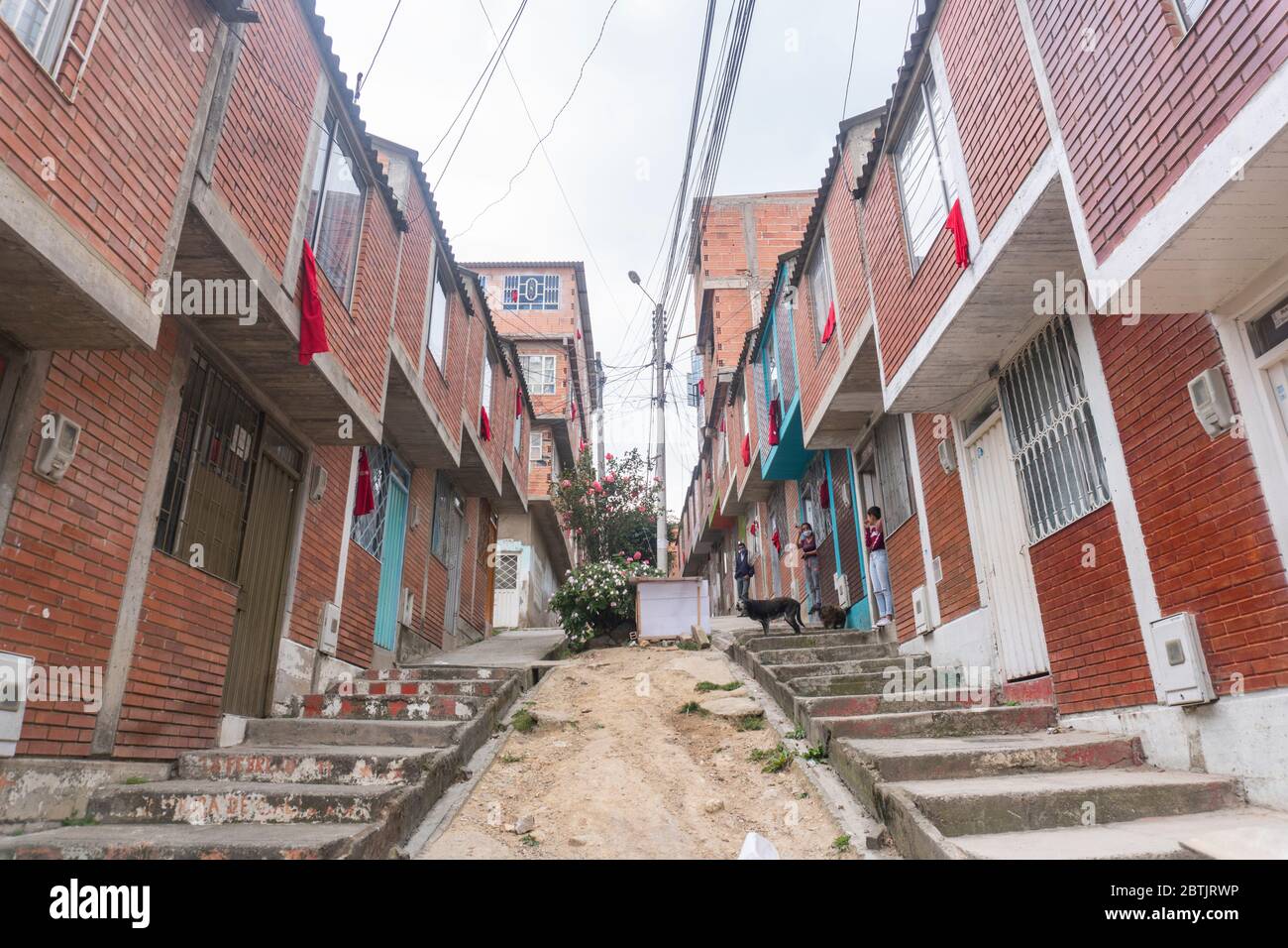 In the windows of many neighborhoods in Bogota, Colombia, on April 19, 2020 the poorest hung red rags as a sign of help. The SOS of poverty amid the c Stock Photo
