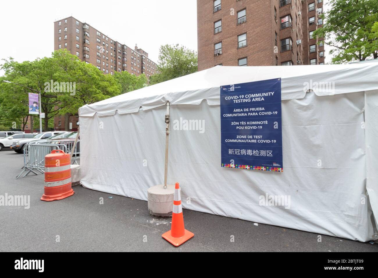 the Covid-19 Community Testing Area tent in front of the Dyckman Houses project in Inwood set up to help monitor the coronavirus or covid-19 pandemic Stock Photo