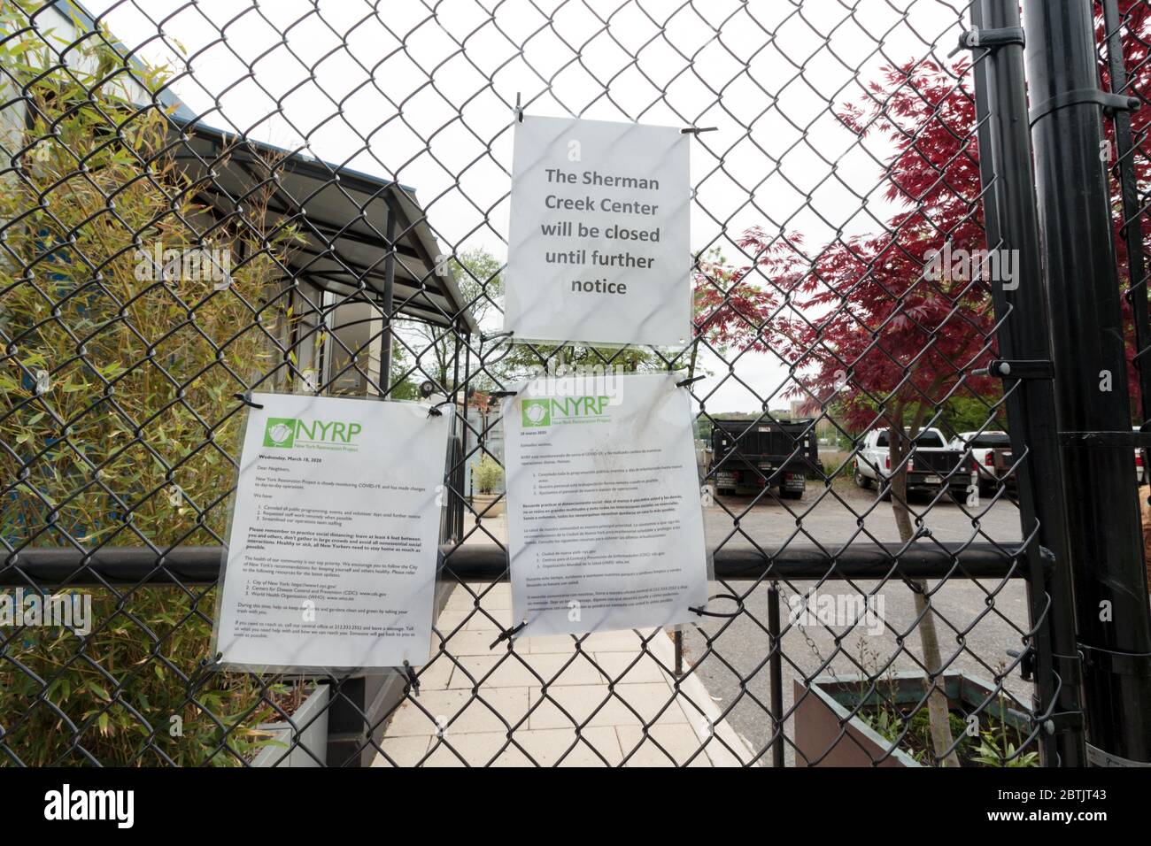 signs at the Sherman Creek Center, a site restored by the New York Restoration Project, say it is closed due to the coronavirus or covid-19 pandemic Stock Photo