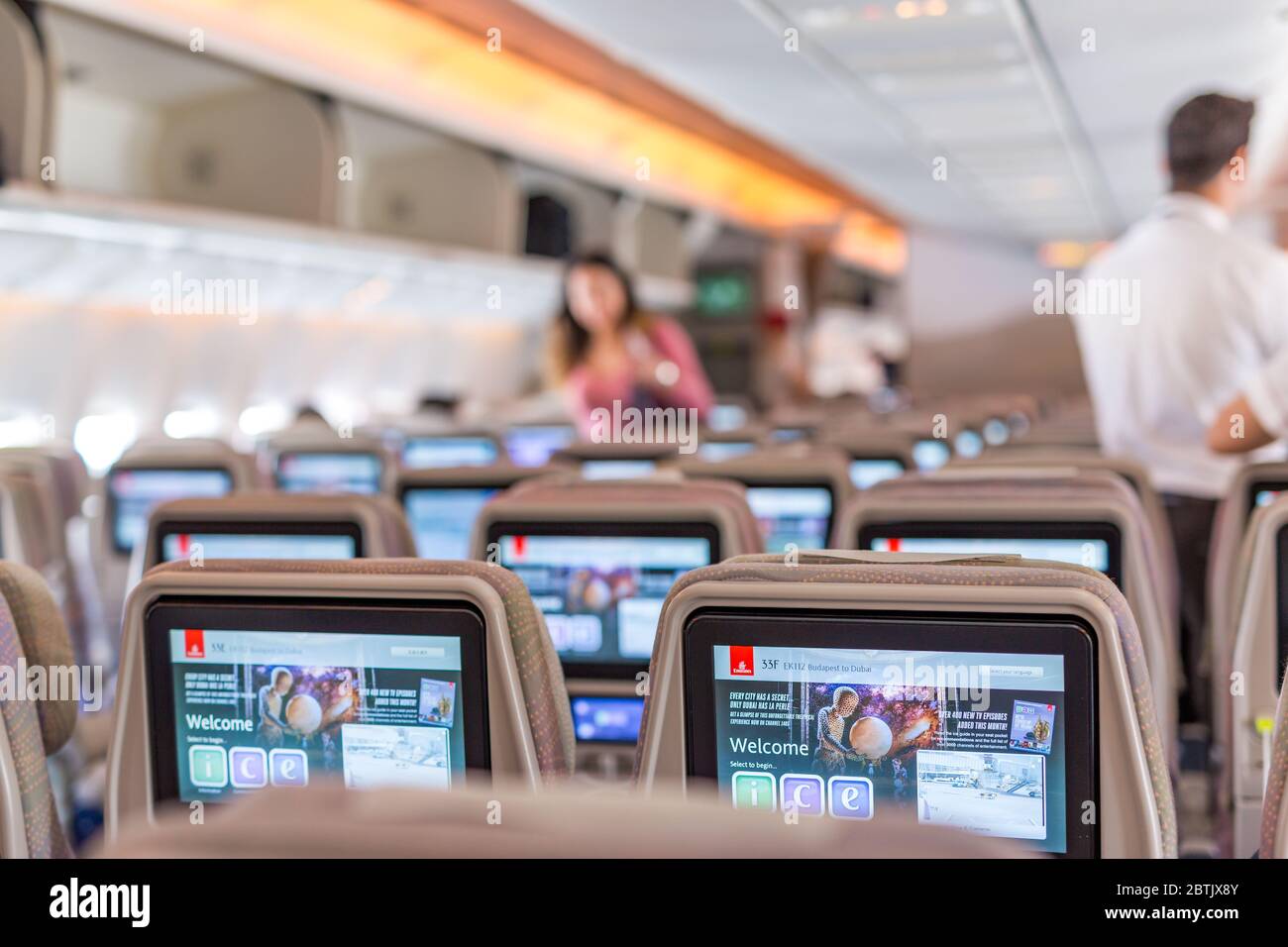 DUBAI, UAE - NOVEMBER 11, 2018: Entertainment display inside Emirates plane. Stock Photo
