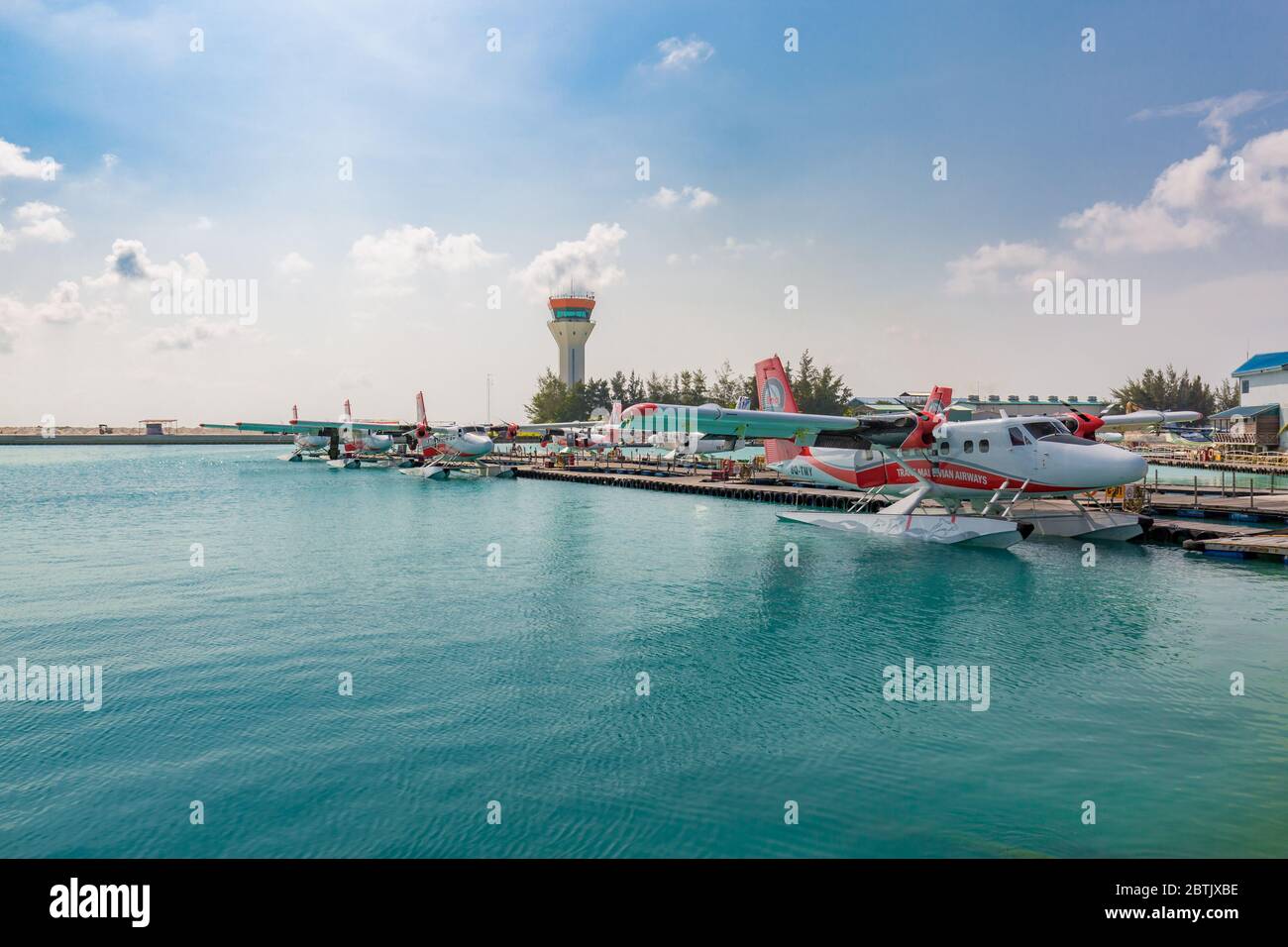 Male, Maldives – May 10, 2019: TMA - Trans Maldivian Airways Twin Otter seaplanes at Male airport (MLE) in the Maldives. Seaplane parking in Male Stock Photo