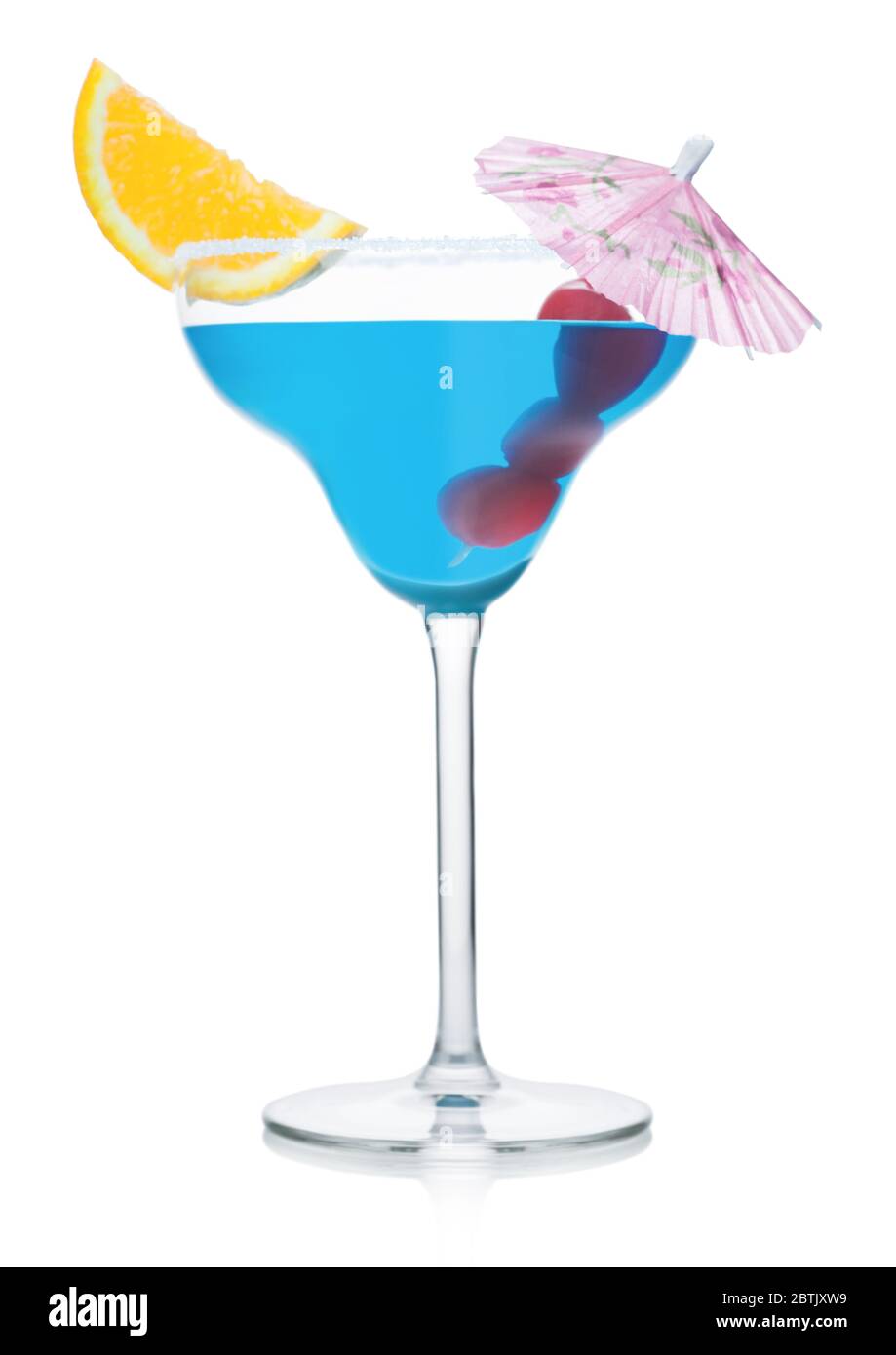 Blue lagoon summer cocktail in margarita glass with orange slice and ...
