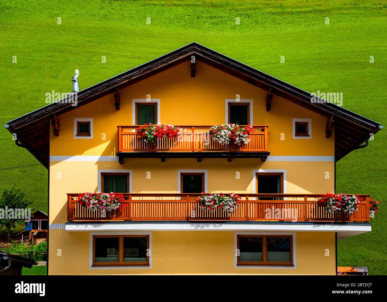 Traditional wooden alpine house solar hi-res stock photography and ...