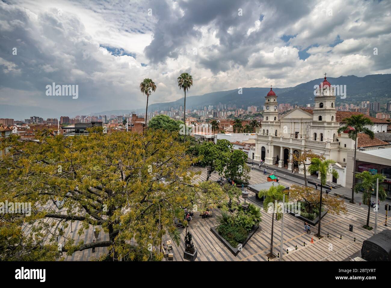 Aerial view of the Main Envigado down town park, showing the main facade of the Saint Gertrudis Church Cathedral Stock Photo